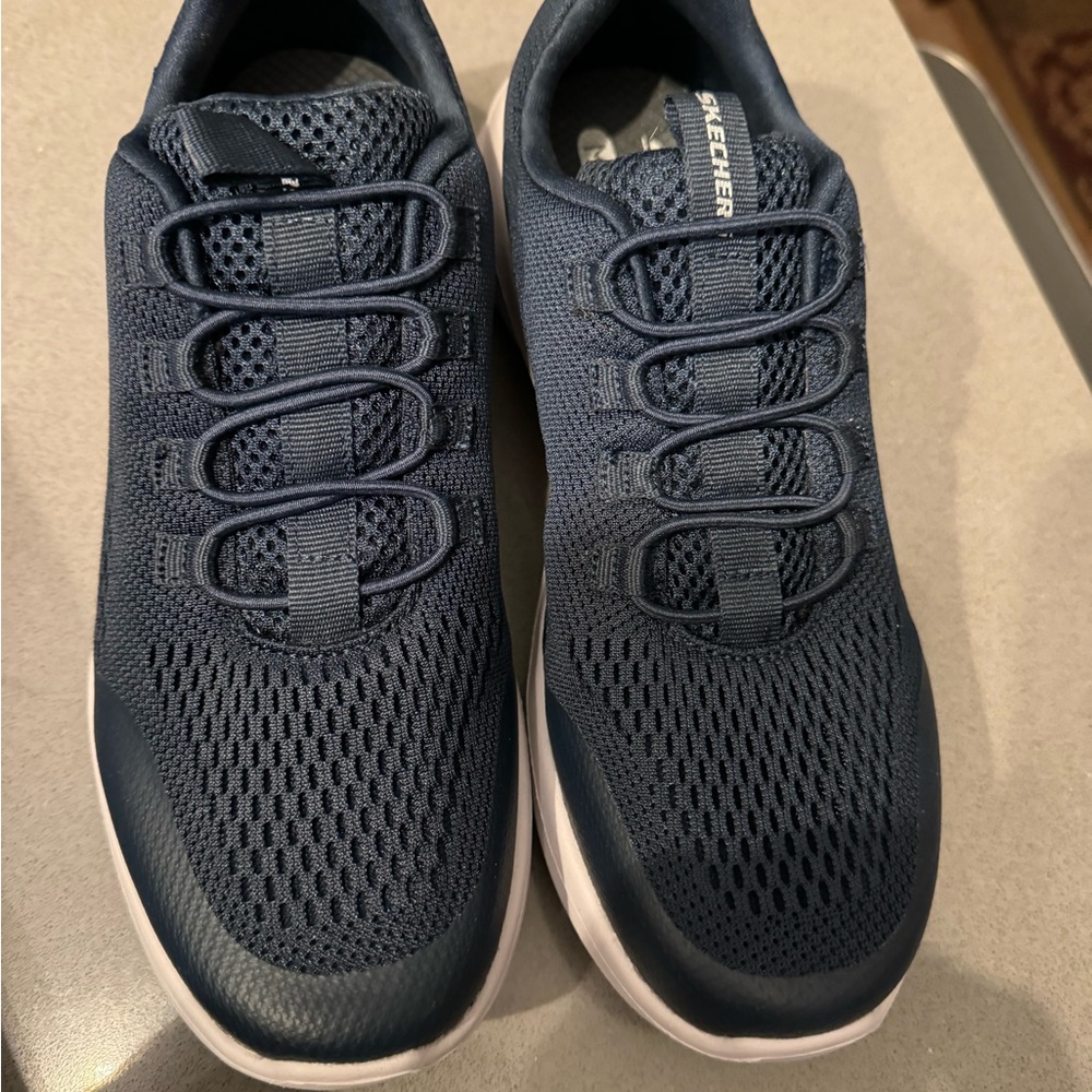 Size 6.5 boys/mens  Skechers slip on sneakers. Brand new, never used.